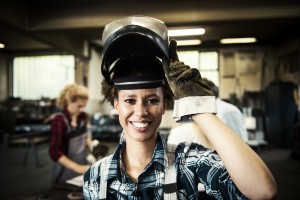 Female Welder in a Metal Shop